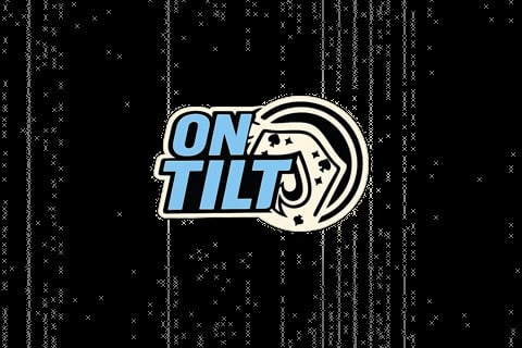 On Tilt arcade game logo with joystick on distorted digital background